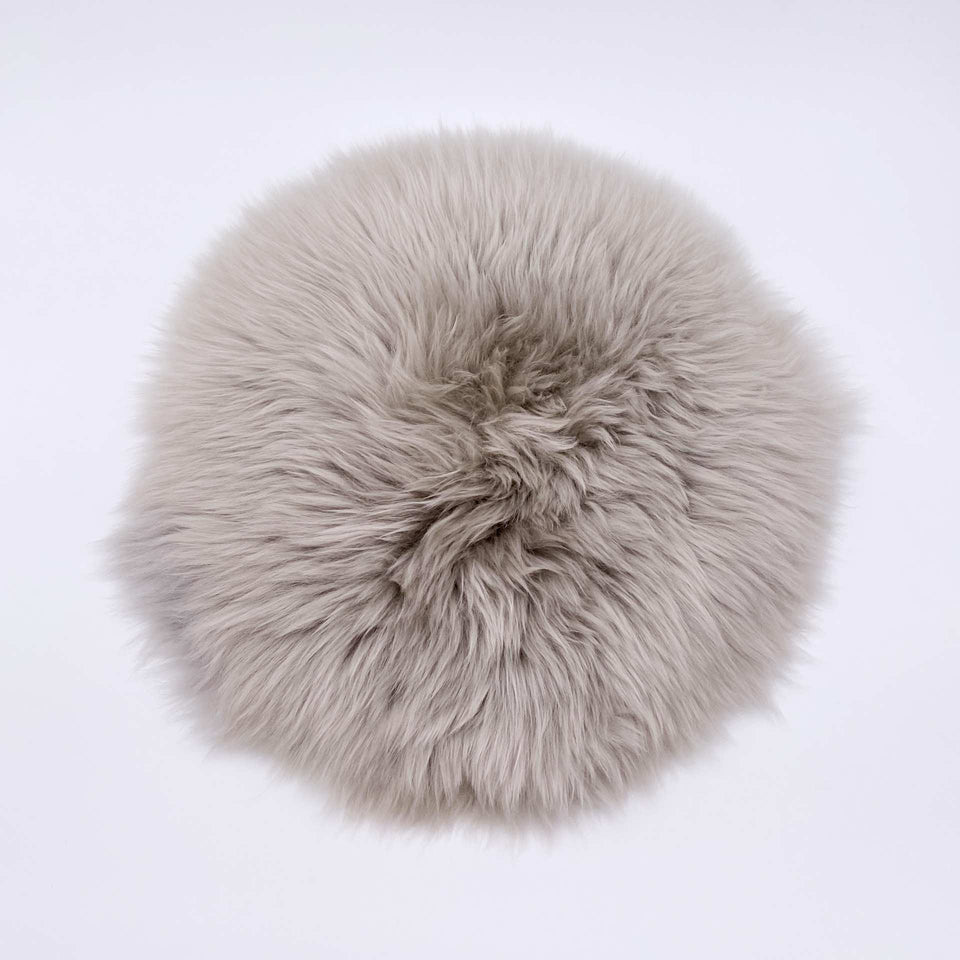 Lammfell Sitzkissen rund platingrau