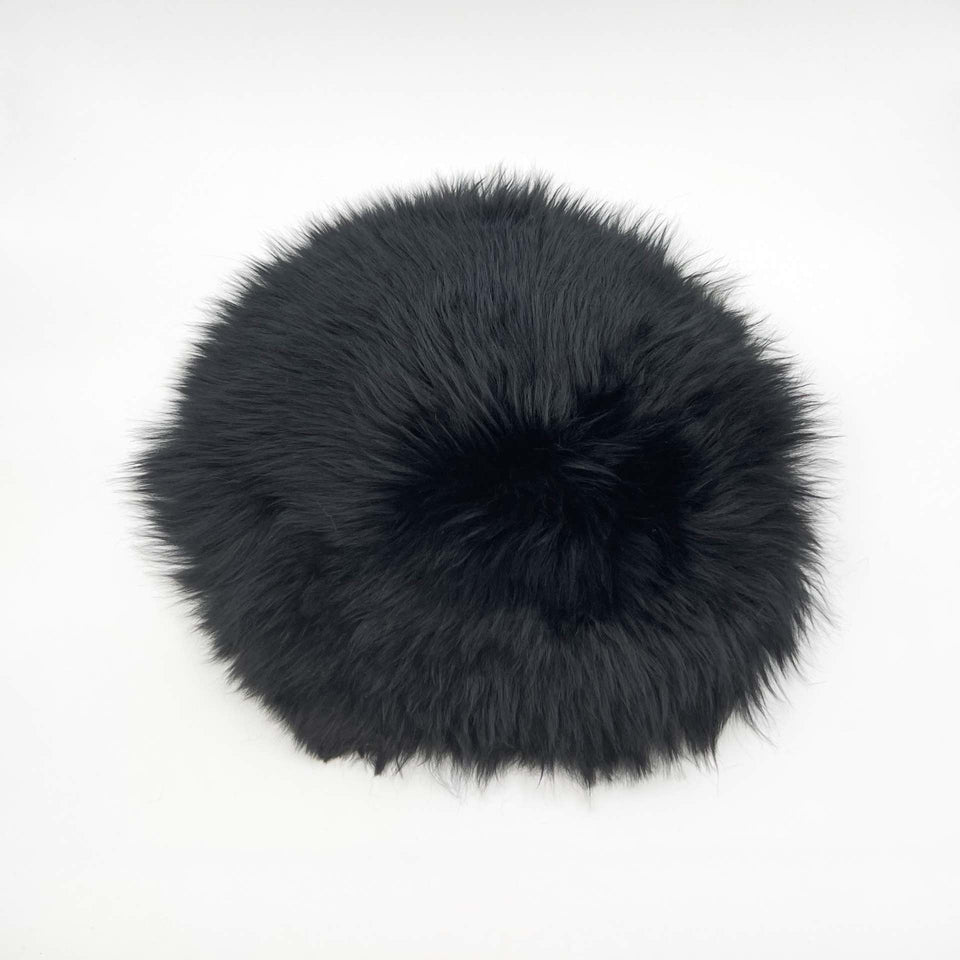 Lammfell Sitzkissen rund schwarz